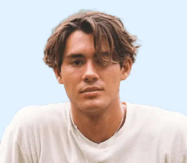 Man with short brown hair wearing white shirt